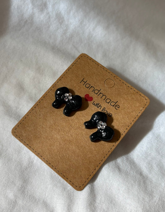 Black bow studs with gems